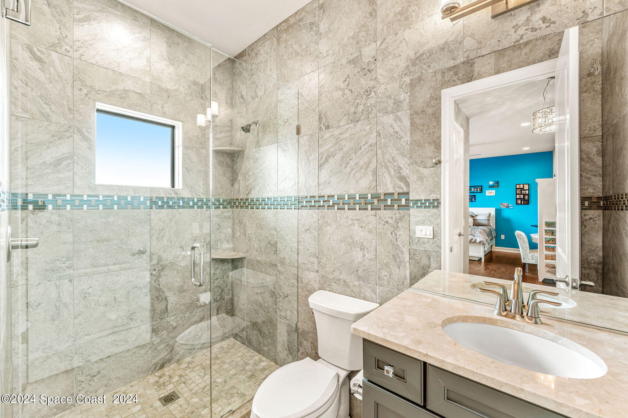 213 Loggerhead Drive Melbourne Beach, FL 32951 - Photo 39 of 58 a bathroom with a sink toilet and shower