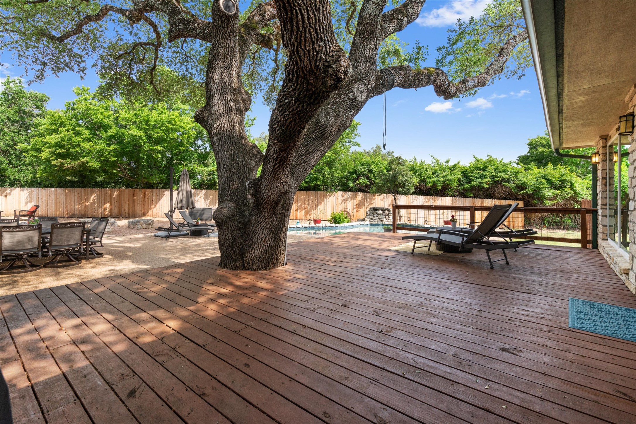 720 Circle G Ranch Road Austin, TX 78737 - Photo 26 of 37 a view of a swimming pool with a patio