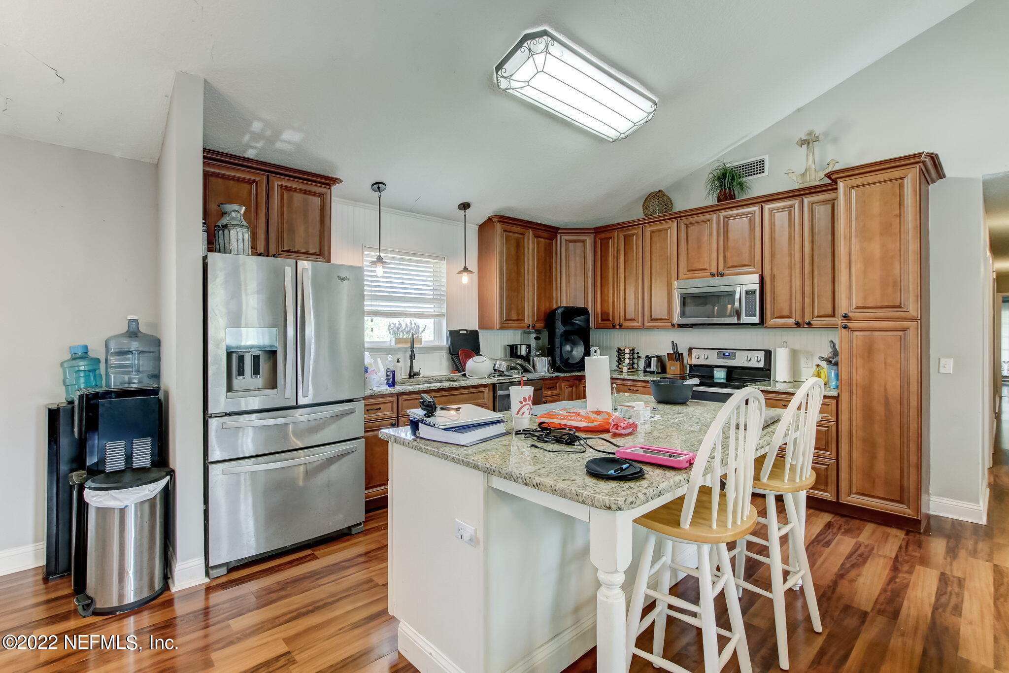 75004 Edwards Road Yulee, FL 32097 - Photo 15 of 62 a kitchen with stainless steel appliances a refrigerator a stove a sink and a refrigerator