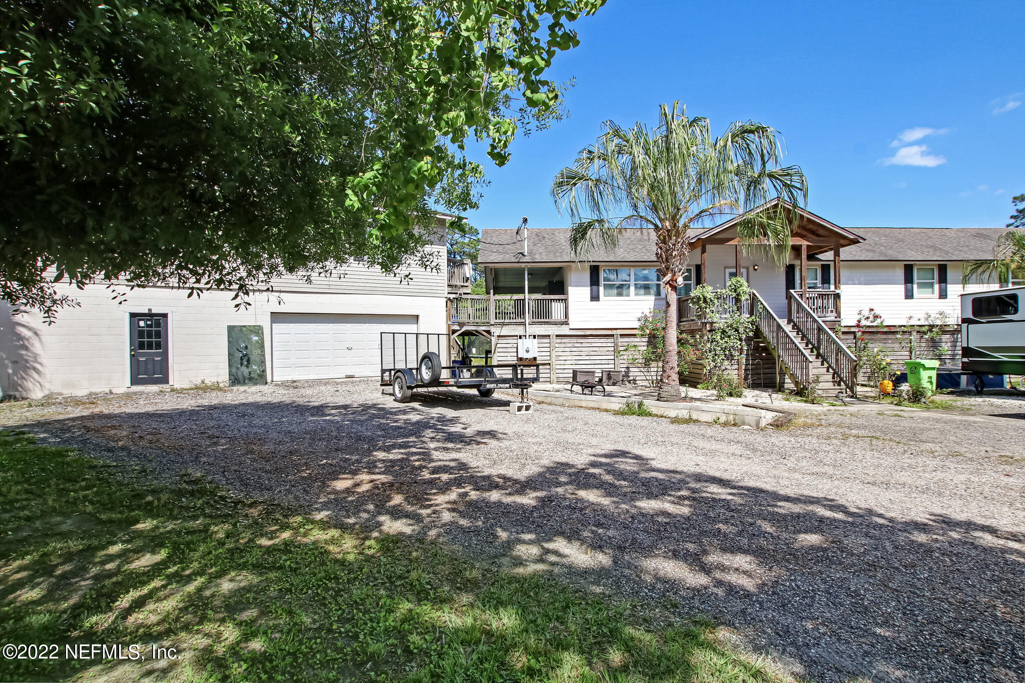75004 Edwards Road Yulee, FL 32097 - Photo 3 of 62 a view of a house with a park