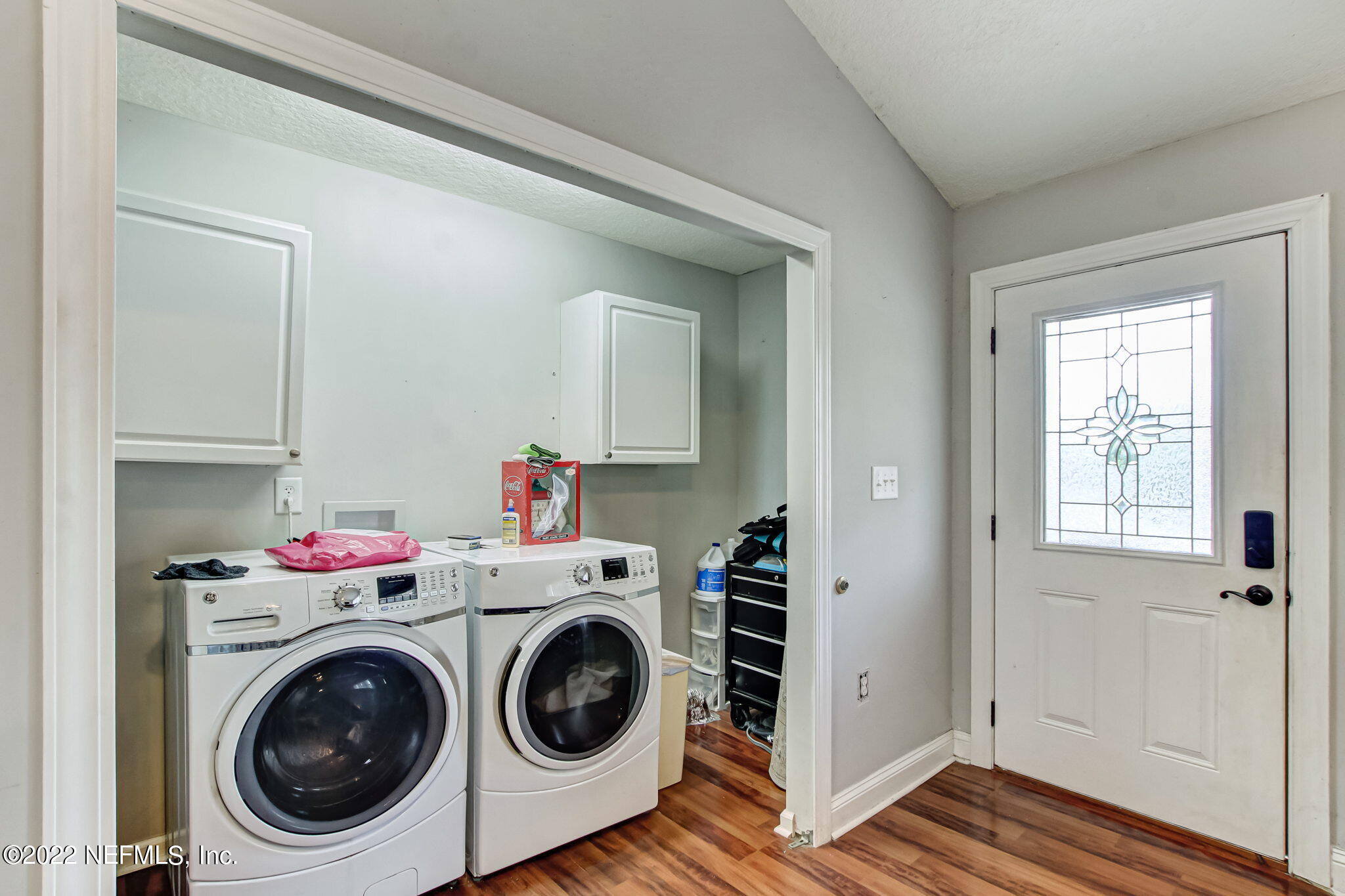 75004 Edwards Road Yulee, FL 32097 - Photo 32 of 62 a utility room with sink dryer and washer
