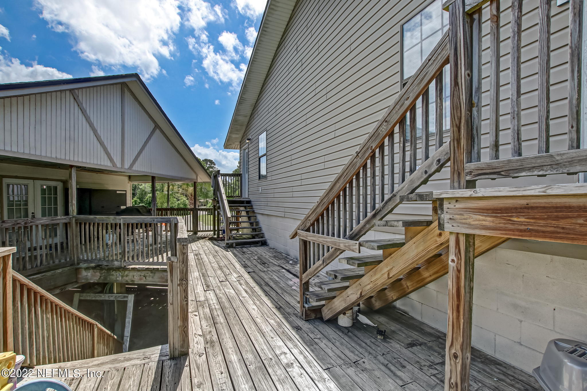 75004 Edwards Road Yulee, FL 32097 - Photo 36 of 62 a view of deck with patio