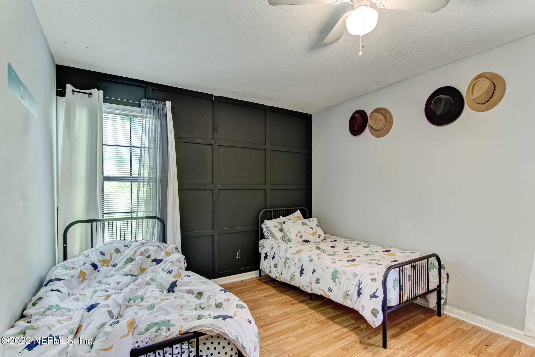 75004 Edwards Road Yulee, FL 32097 - Photo 49 of 62 a bedroom with a bed and a window