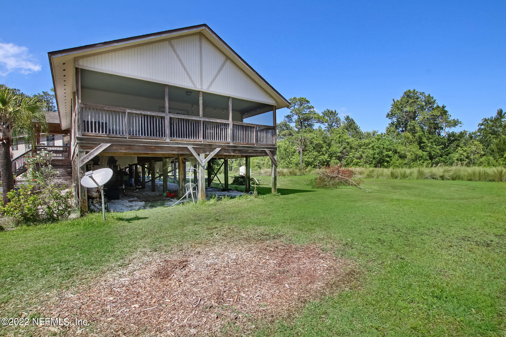 75004 Edwards Road Yulee, FL 32097 - Photo 57 of 62 a view of house with backyard