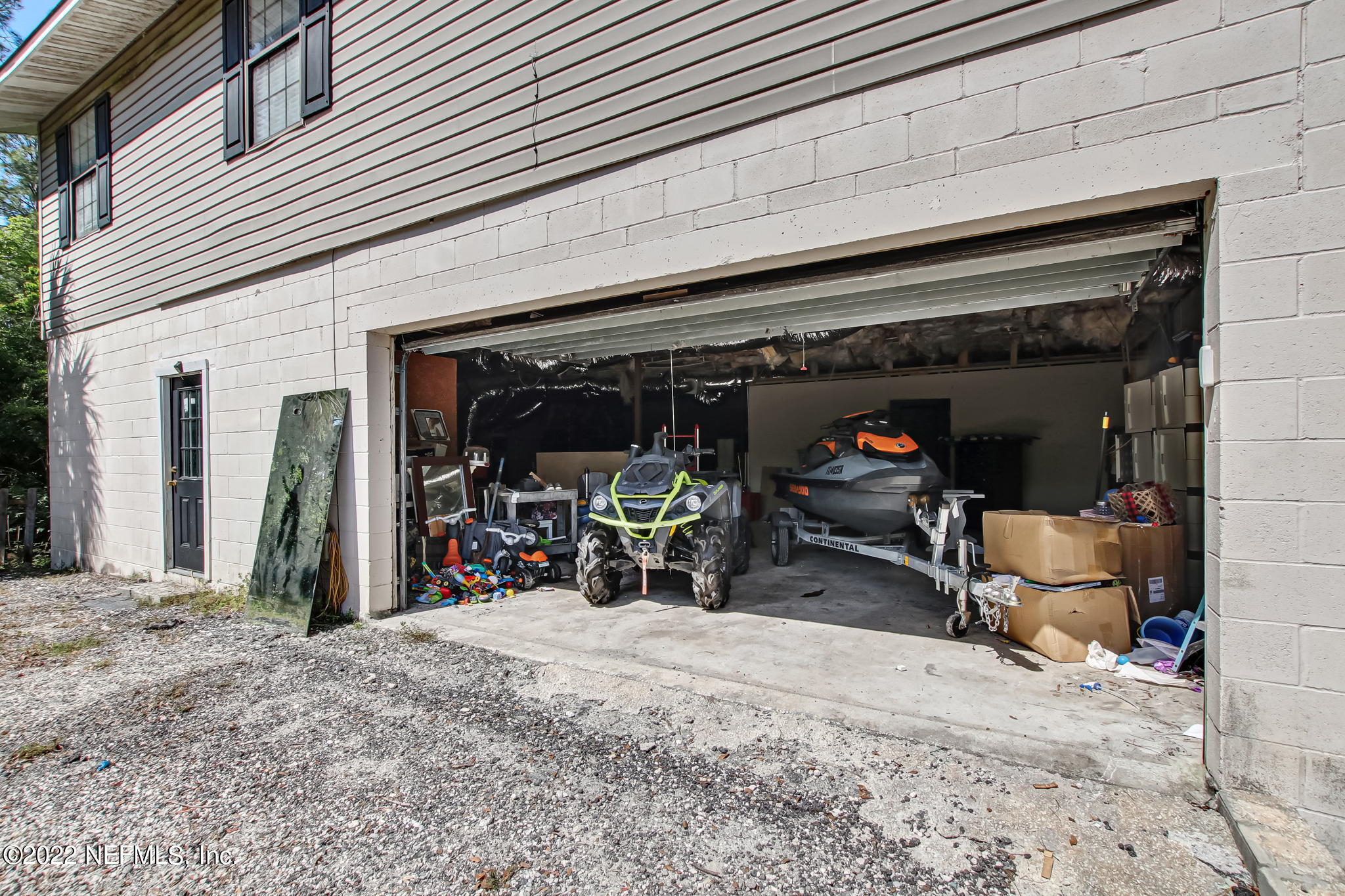 75004 Edwards Road Yulee, FL 32097 - Photo 59 of 62 a view of a storage room with a lot of stuff