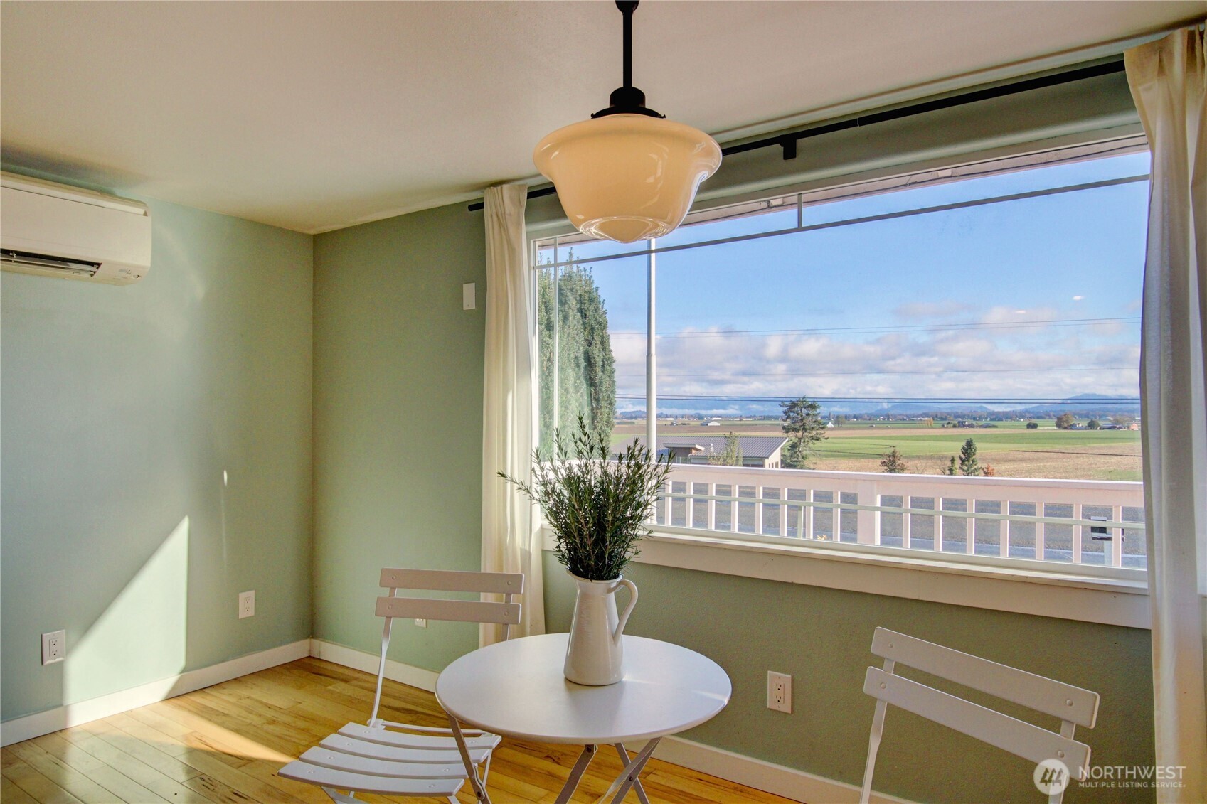 18122 Best Road Mount Vernon, WA 98273 - Photo 15 of 40 a living room with furniture and a floor to ceiling window