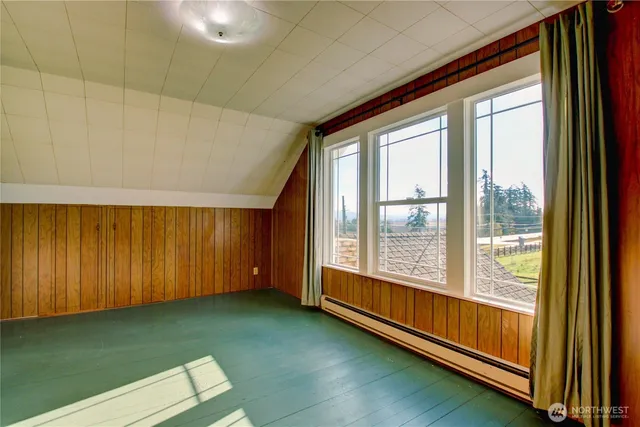 a view of an empty room and window