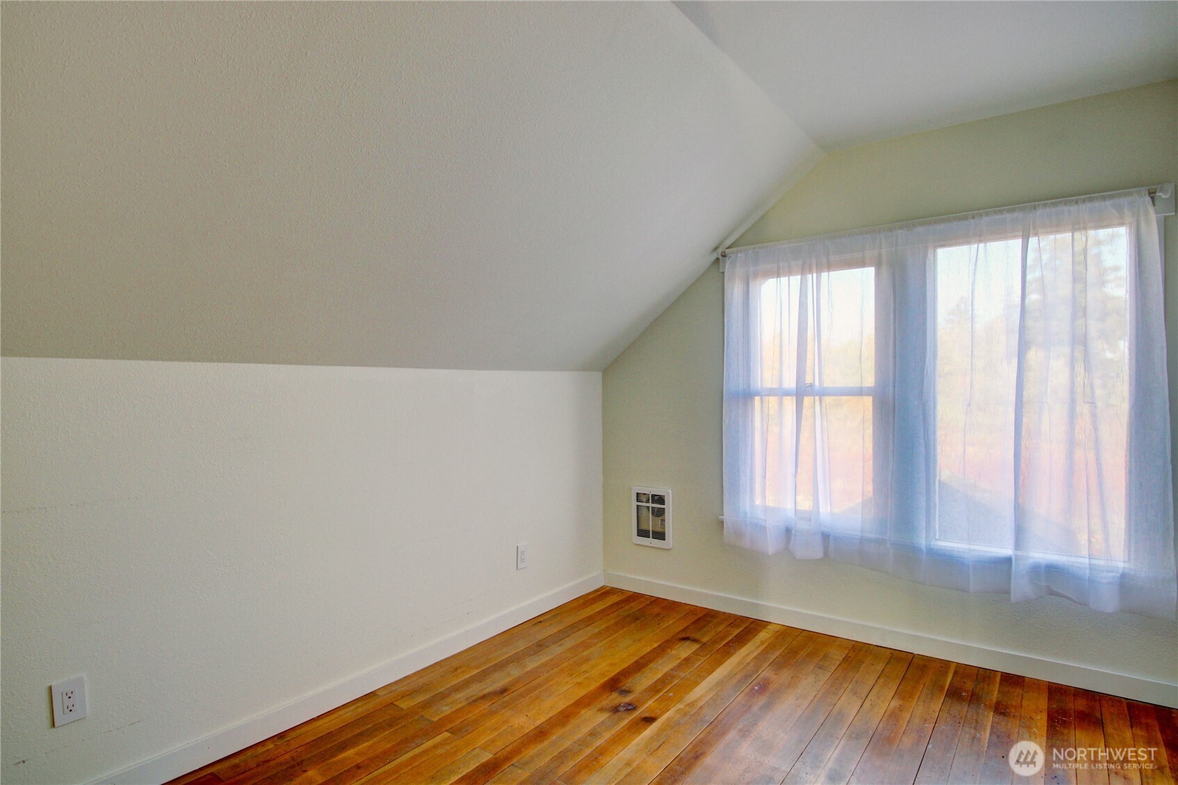 18122 Best Road Mount Vernon, WA 98273 - Photo 27 of 40 an empty room with wooden floor and windows