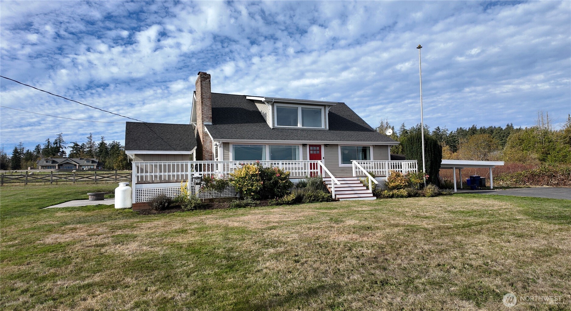 18122 Best Road Mount Vernon, WA 98273 - Photo 3 of 40 a front view of house with yard and trees in the background