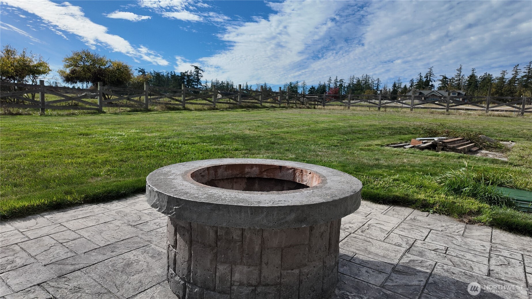18122 Best Road Mount Vernon, WA 98273 - Photo 33 of 40 a view of a swimming pool in a yard with green space