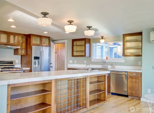 a bathroom with a double vanity sink and a mirror