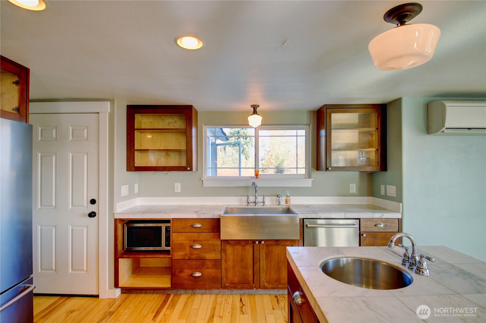 18122 Best Road Mount Vernon, WA 98273 - Photo 8 of 40 a kitchen with stainless steel appliances a sink stove and cabinets