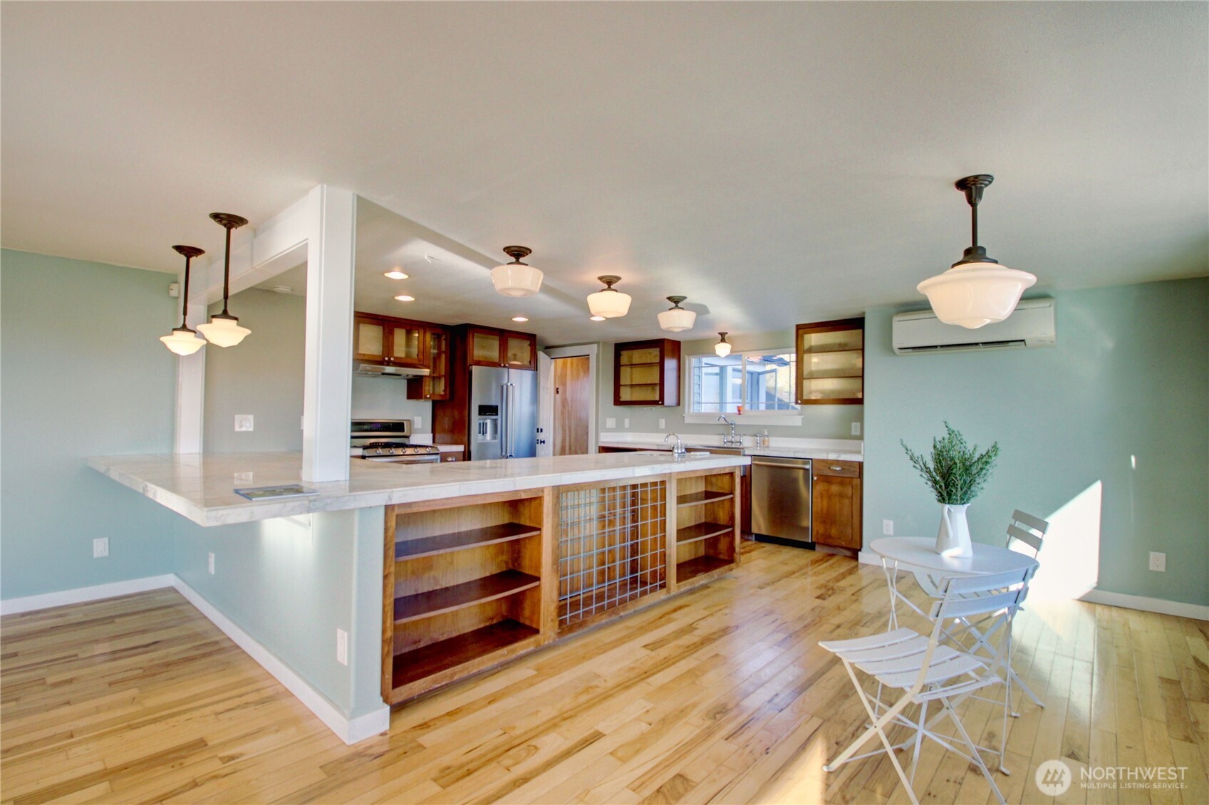 18122 Best Road Mount Vernon, WA 98273 - Photo 9 of 40 a large kitchen with stainless steel appliances a large counter top a stove and a wooden floors