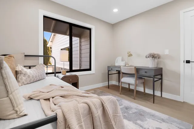 a front view of a house with parking area