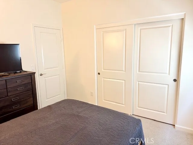 a view of an empty room and workspace