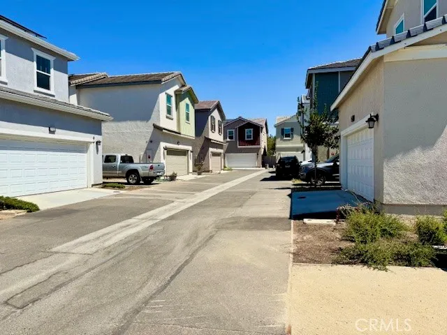 a view of a street with houses