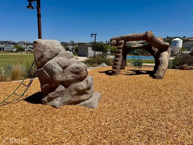 a view of a patio with swimming pool table and chairs