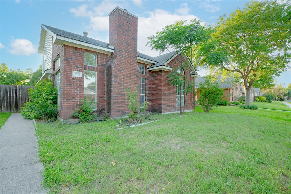 3721 Smartt Street Rowlett, TX 75088 - Photo 2 of 27 front view of a house with a yard