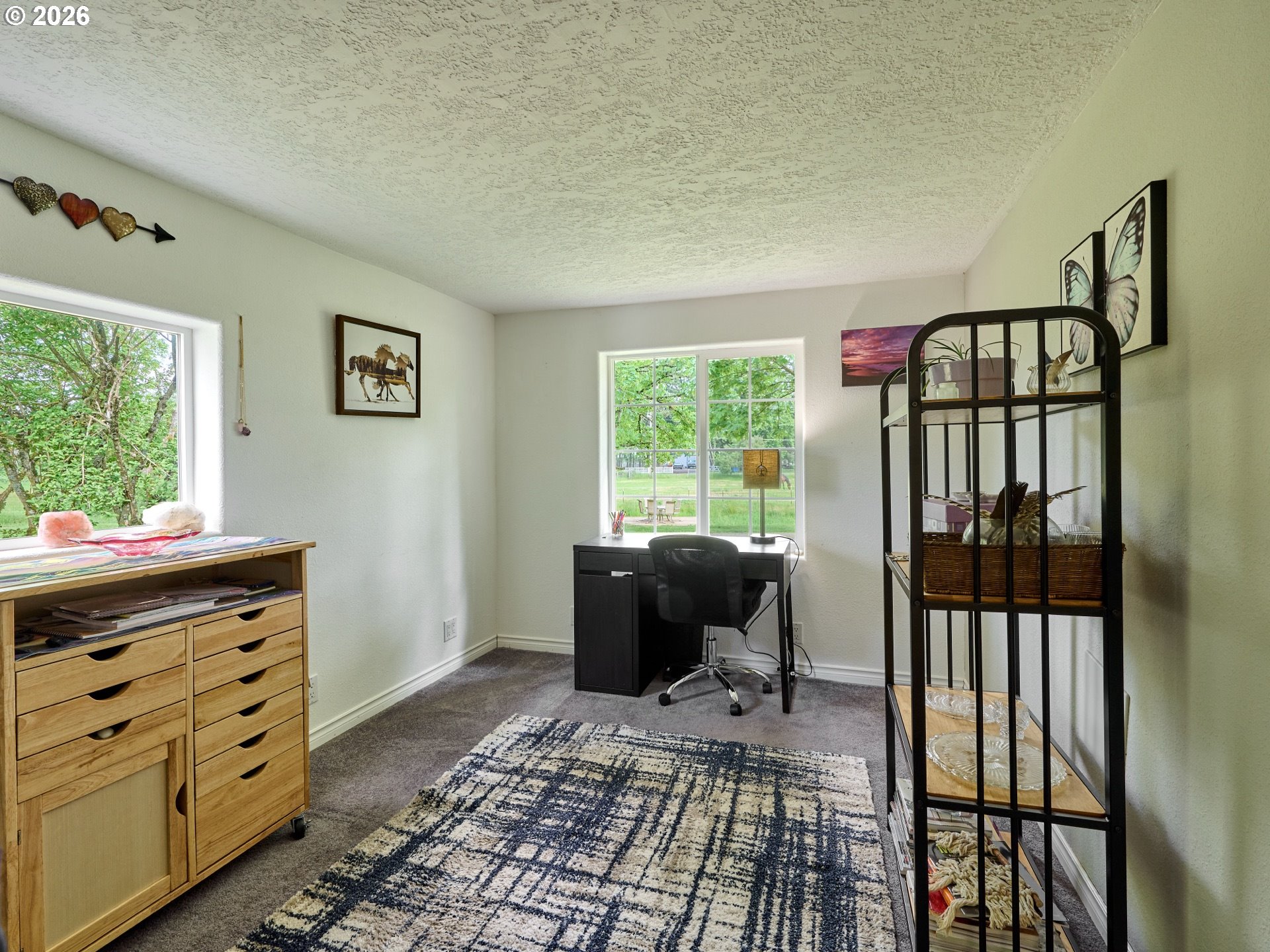 12175 West Stayton Road Southeast Aumsville, OR 97325 - Photo 19 of 48 a bedroom with furniture and a window