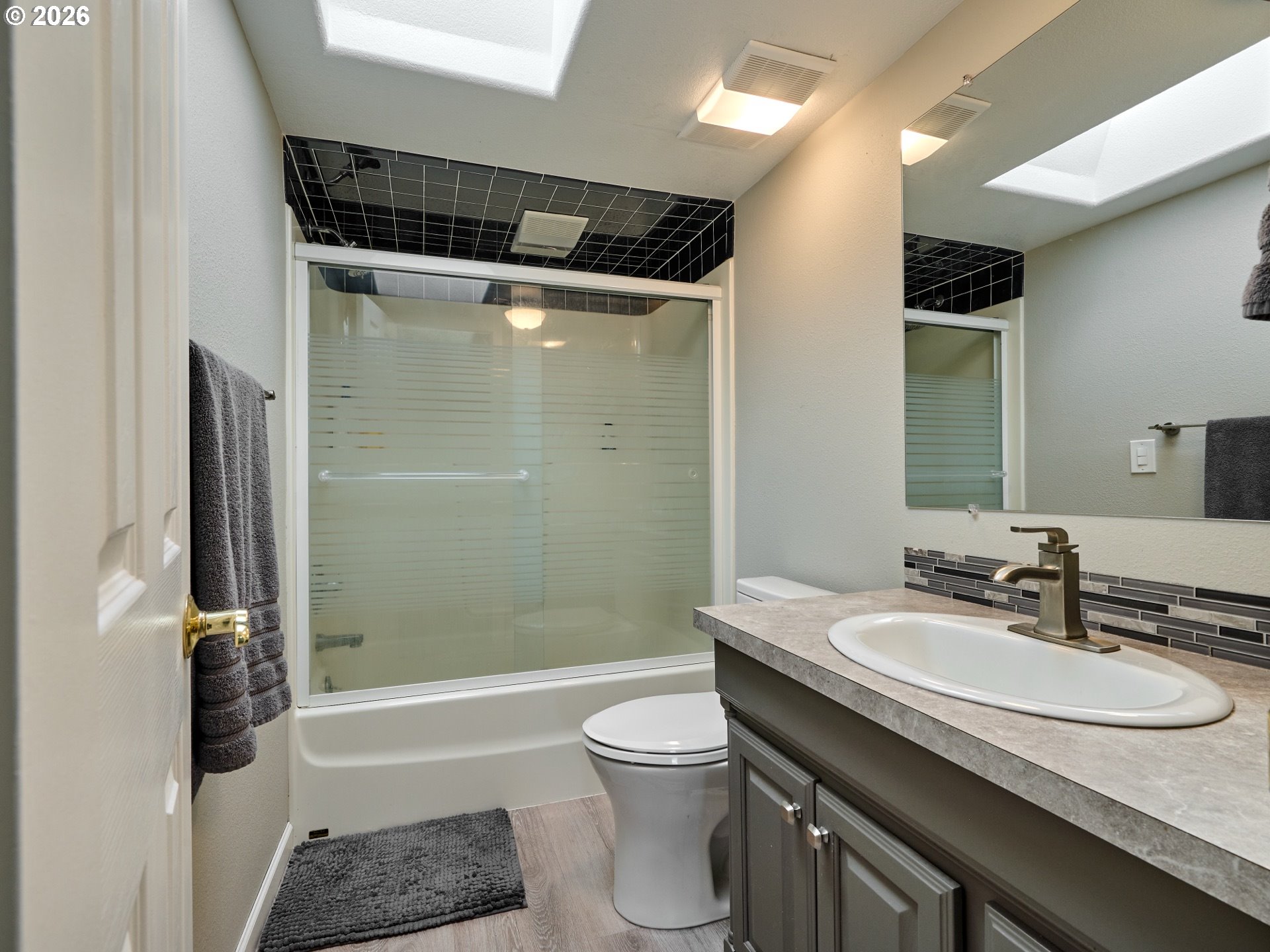 12175 West Stayton Road Southeast Aumsville, OR 97325 - Photo 21 of 48 a bathroom with a sink a toilet and shower