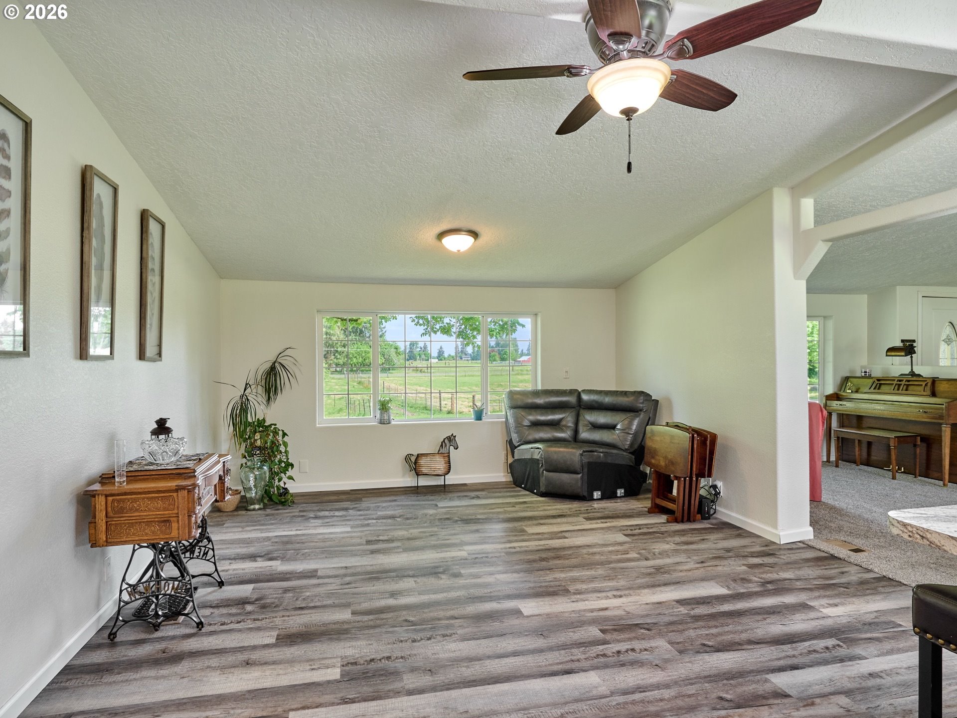 12175 West Stayton Road Southeast Aumsville, OR 97325 - Photo 8 of 48 a living room with furniture and a window