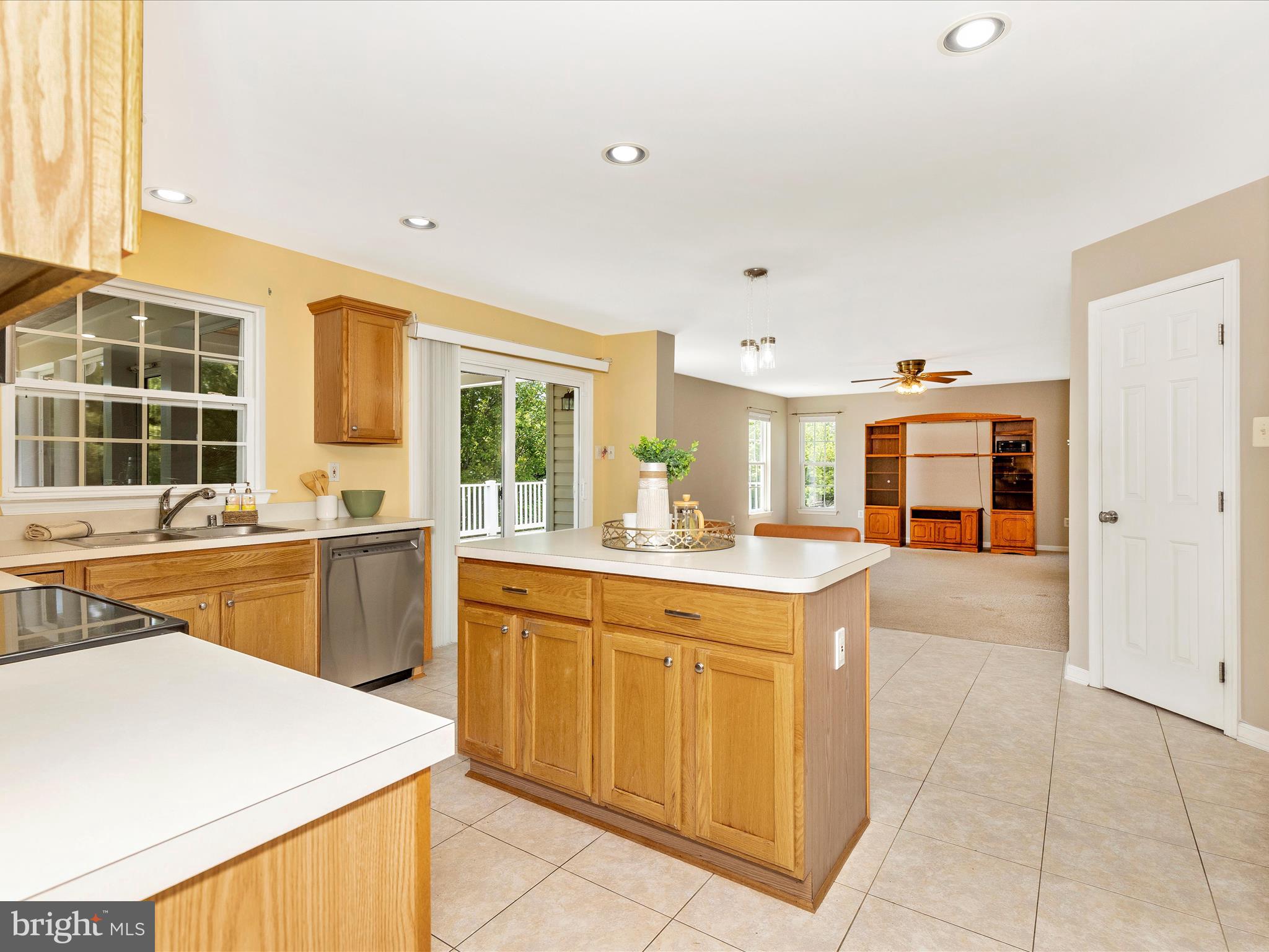 1402 Marian Way Mount Airy, MD 21771 - Photo 12 of 66 a kitchen with a sink stove and cabinets