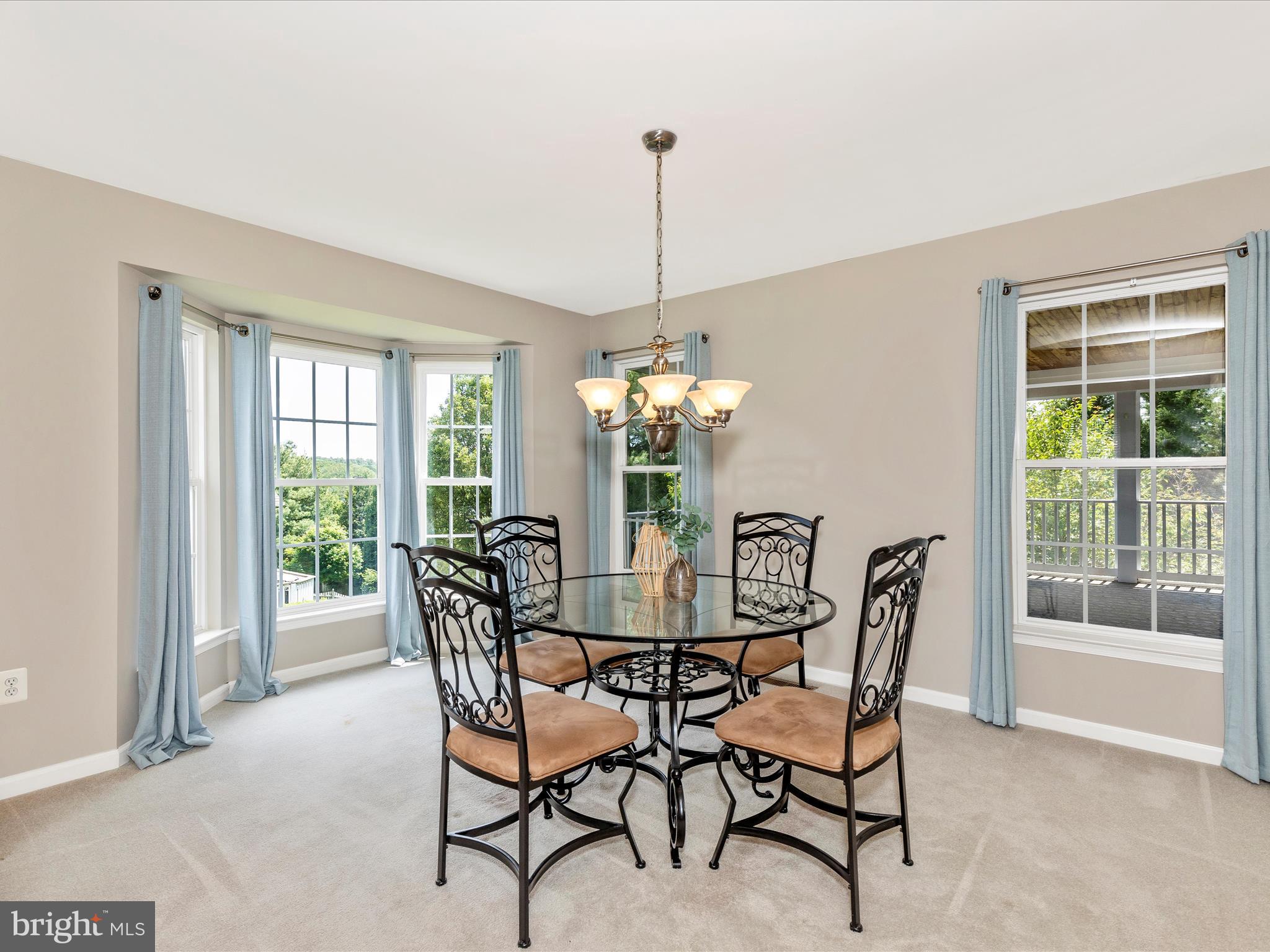 1402 Marian Way Mount Airy, MD 21771 - Photo 19 of 66 a dining room with furniture window and outside view