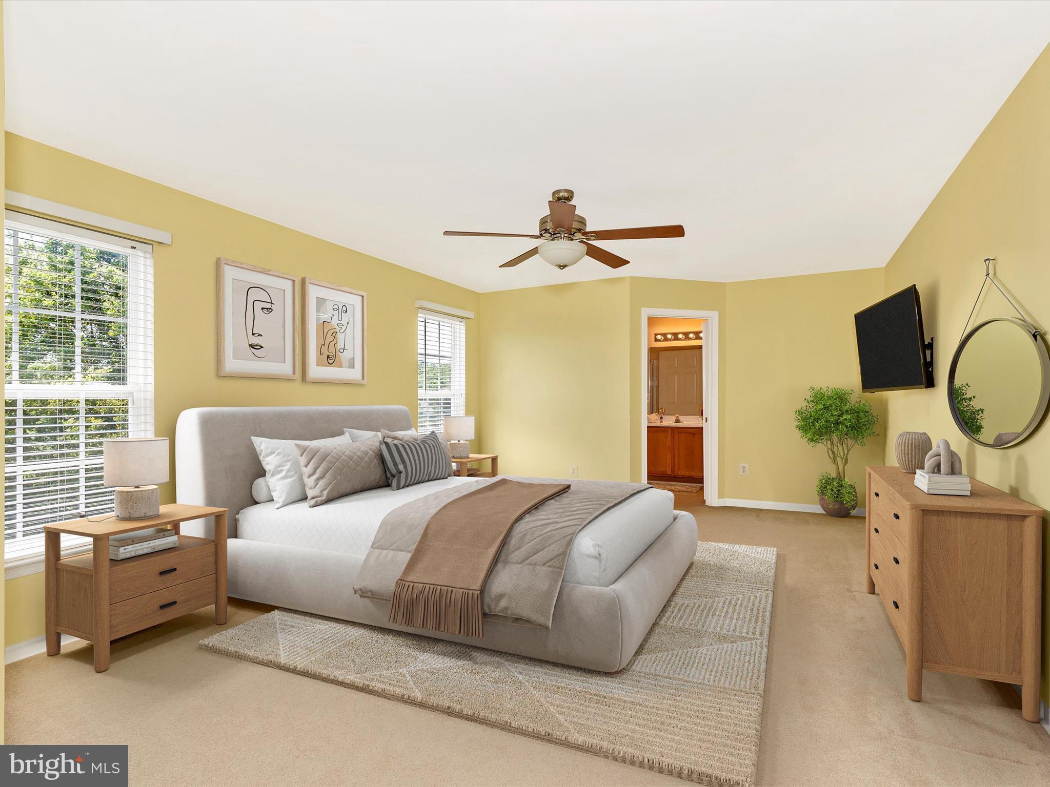 1402 Marian Way Mount Airy, MD 21771 - Photo 26 of 66 a bedroom with a large bed and wooden floor