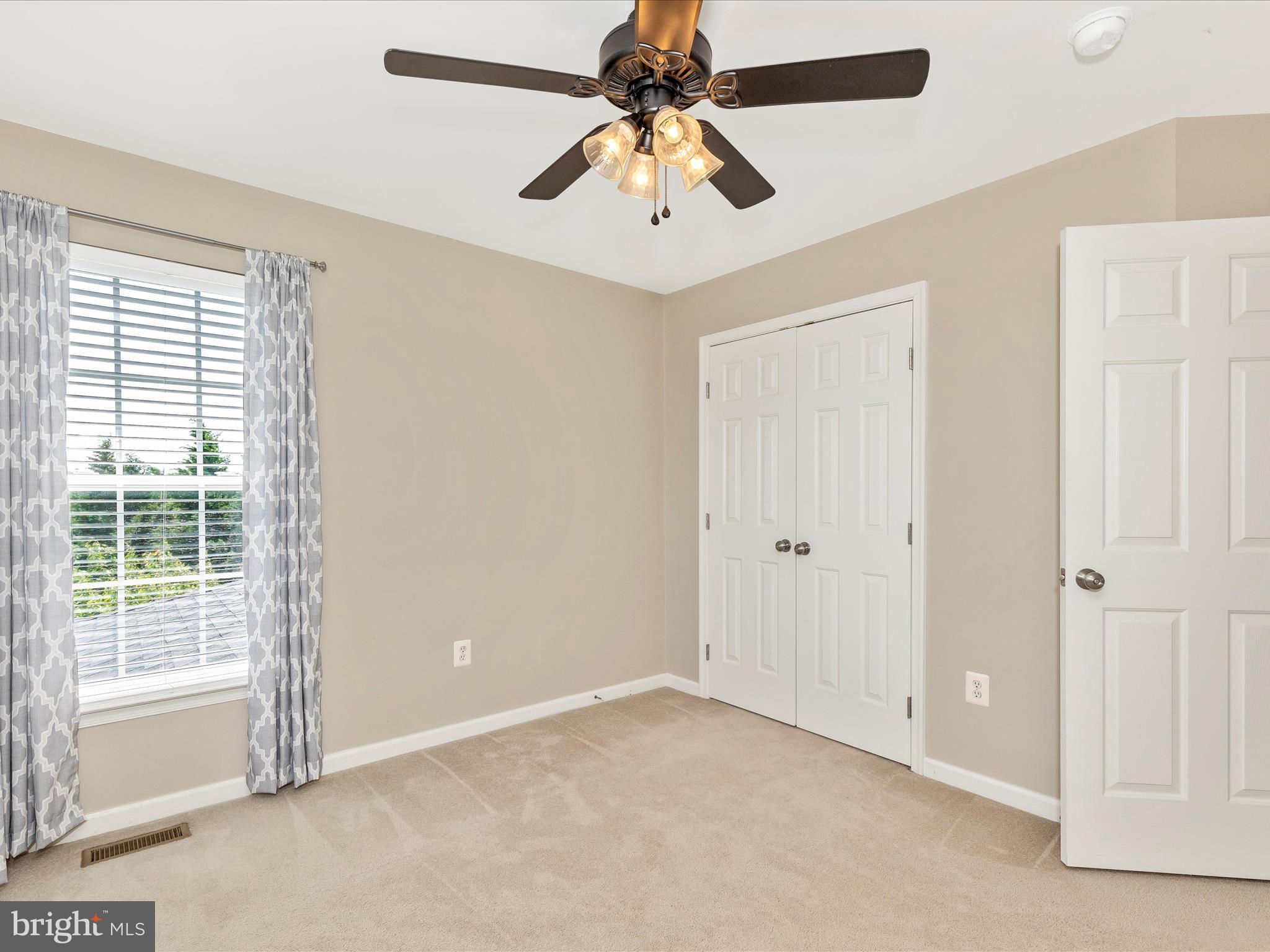 1402 Marian Way Mount Airy, MD 21771 - Photo 40 of 66 a view of an empty room with a window
