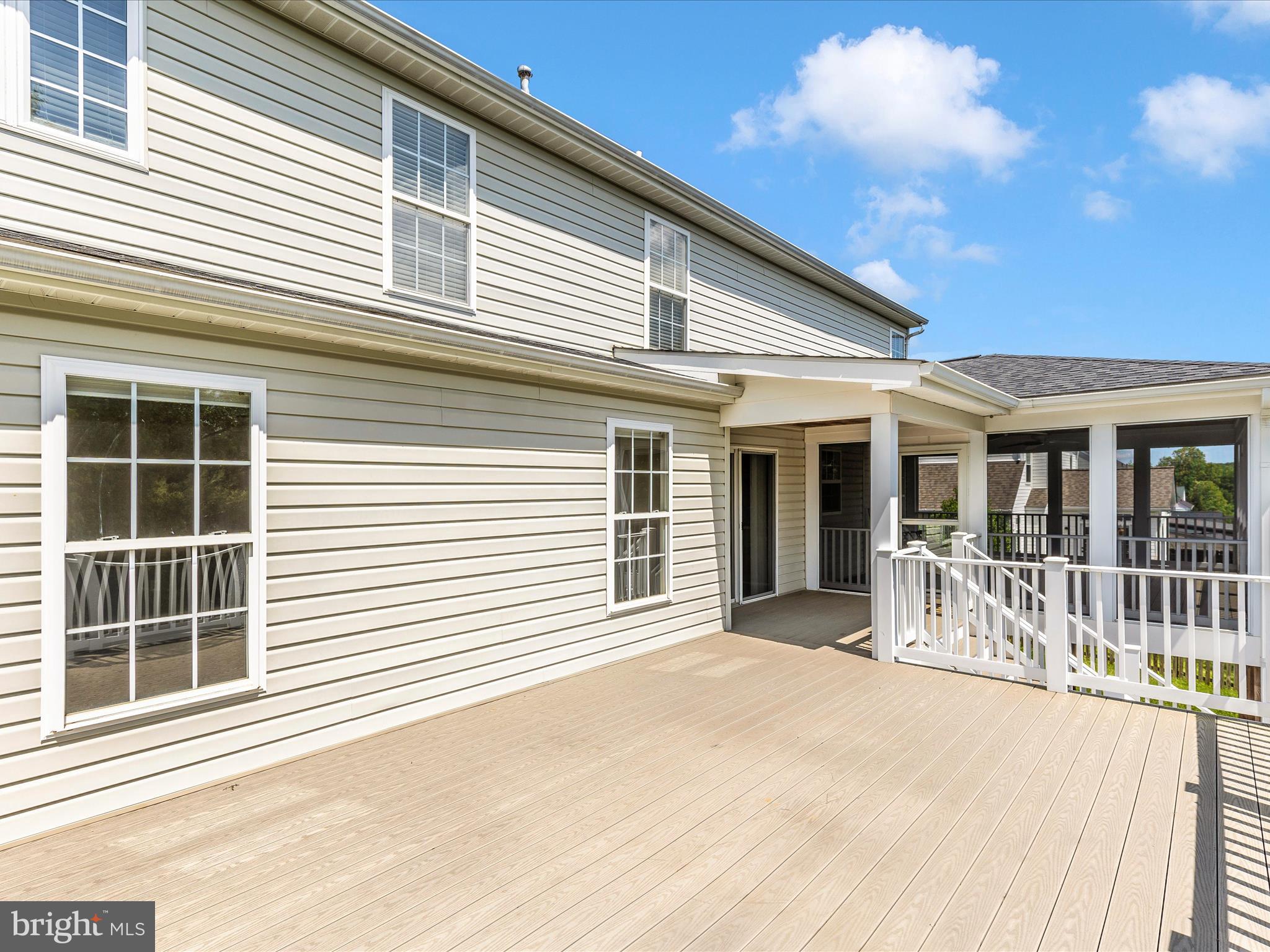 1402 Marian Way Mount Airy, MD 21771 - Photo 4 of 66 a front view of a house with a large window
