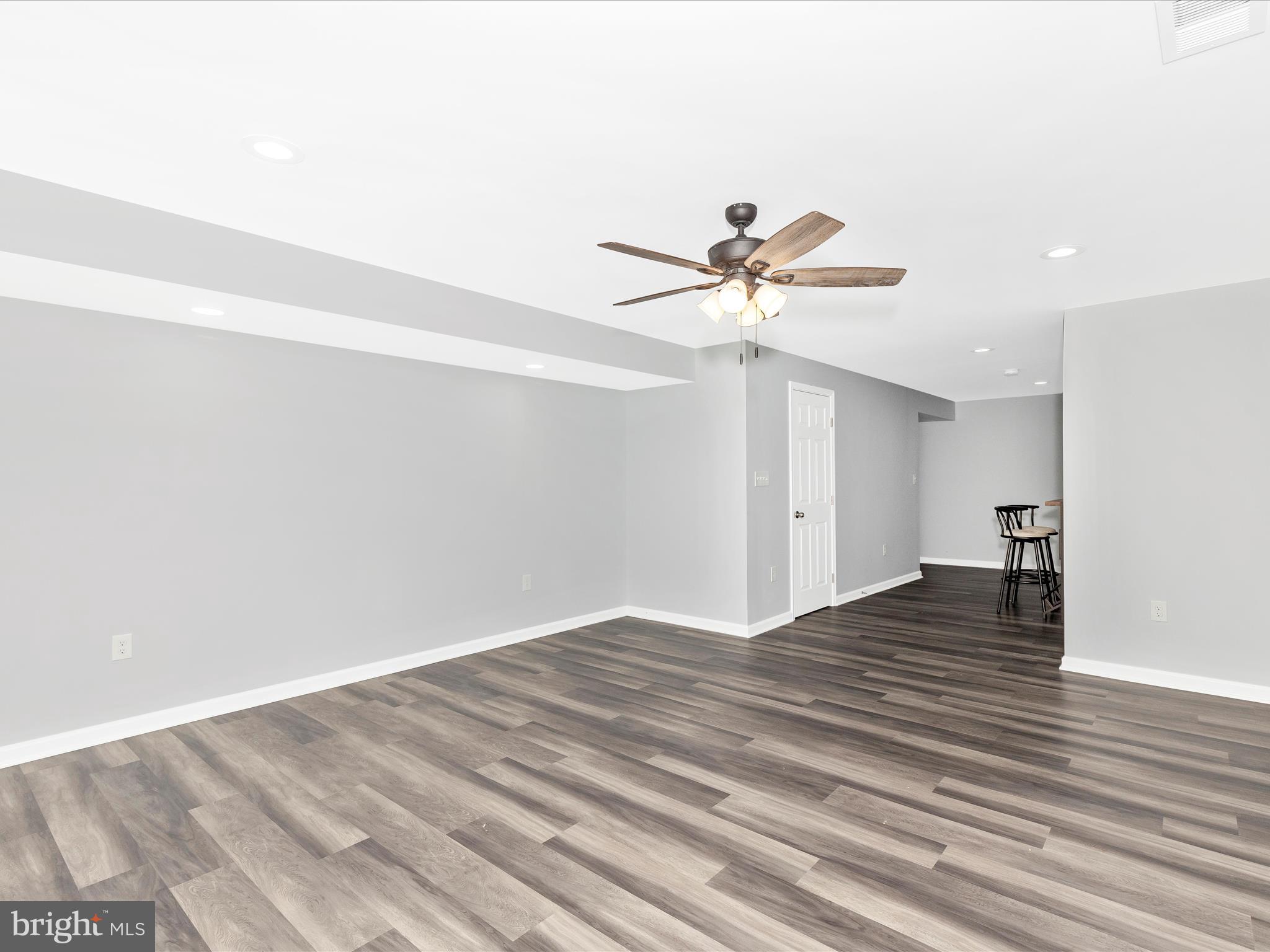 1402 Marian Way Mount Airy, MD 21771 - Photo 44 of 66 a view of a livingroom with a ceiling fan