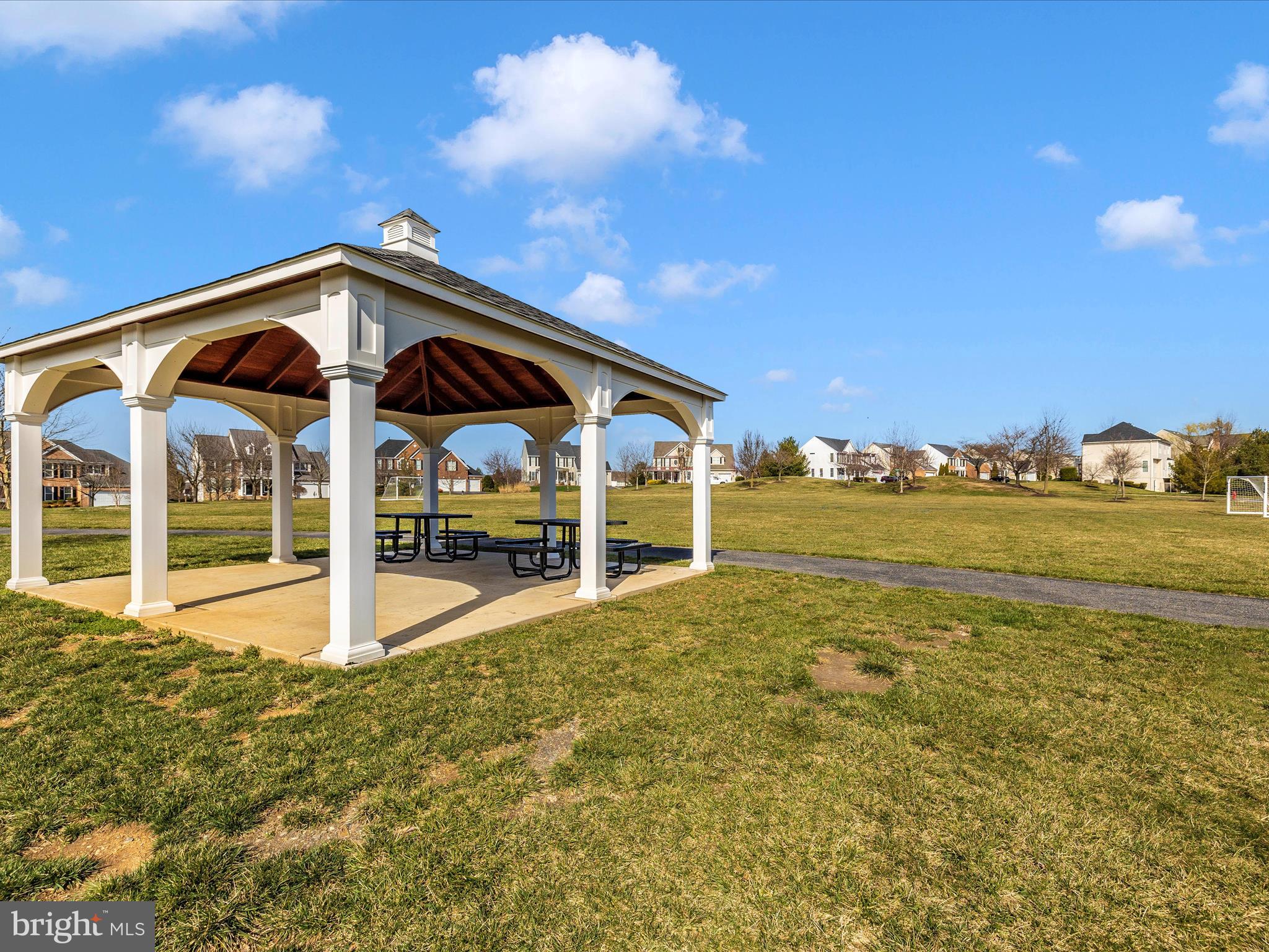 1402 Marian Way Mount Airy, MD 21771 - Photo 56 of 66 a view of a patio with a table and chairs
