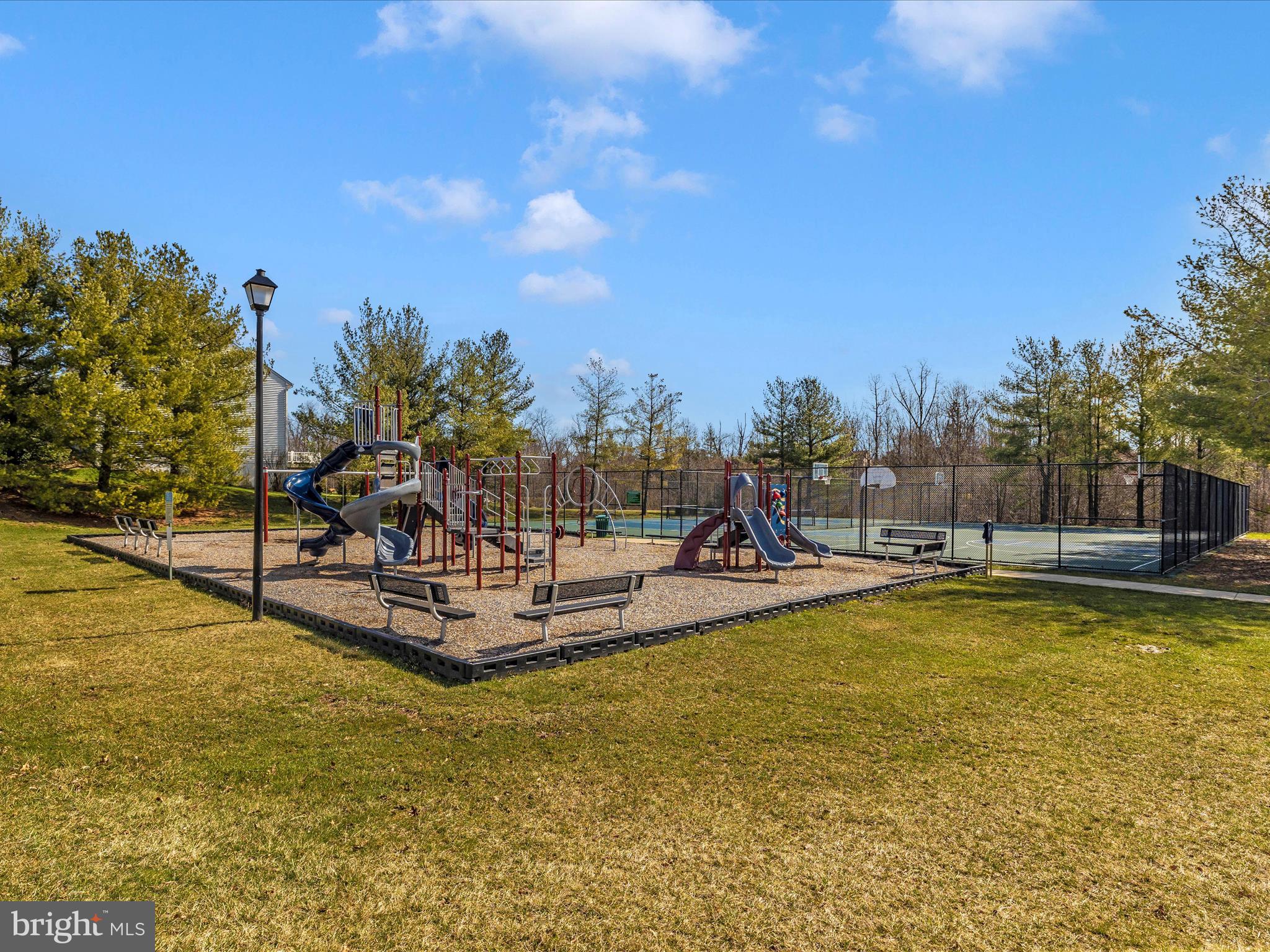 1402 Marian Way Mount Airy, MD 21771 - Photo 60 of 66 a view of a swimming pool with outdoor seating
