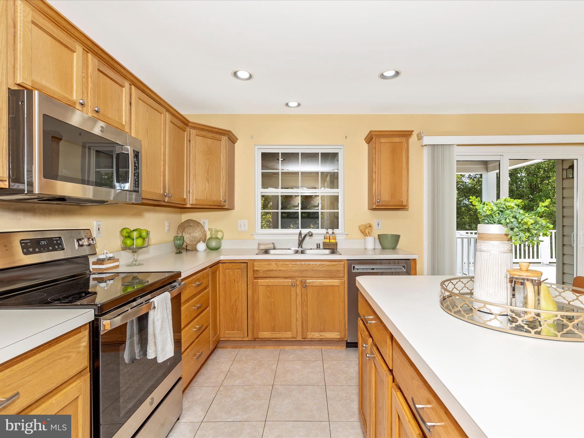 1402 Marian Way Mount Airy, MD 21771 - Photo 10 of 66 a kitchen with stainless steel appliances granite countertop a sink and cabinets