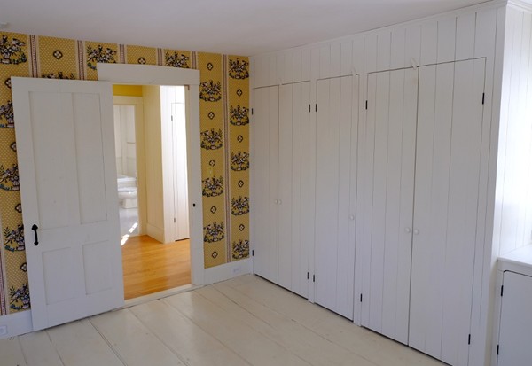 269 Russell Hill Road Ashburnham, MA 01430 - Photo 13 of 25 a view of a hallway with wooden door and closet