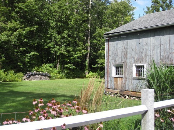 269 Russell Hill Road Ashburnham, MA 01430 - Photo 22 of 25 a view of backyard with wooden fence