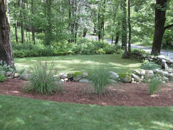 269 Russell Hill Road Ashburnham, MA 01430 - Photo 24 of 25 a backyard of a house with lots of green space