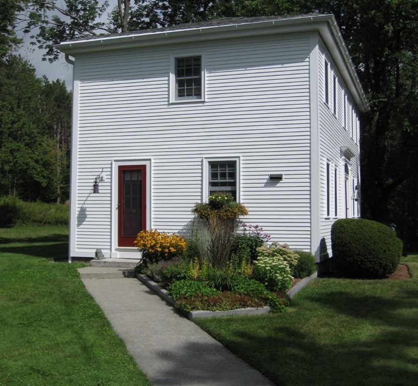 269 Russell Hill Road Ashburnham, MA 01430 - Photo 3 of 25 a house that has a lot of plants in it