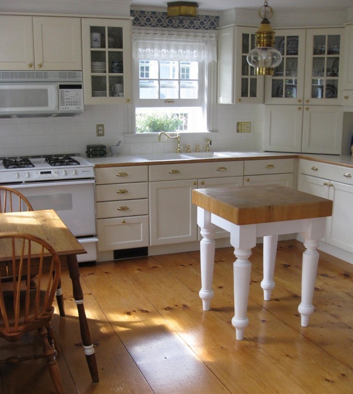 269 Russell Hill Road Ashburnham, MA 01430 - Photo 4 of 25 a kitchen with a sink cabinets and window