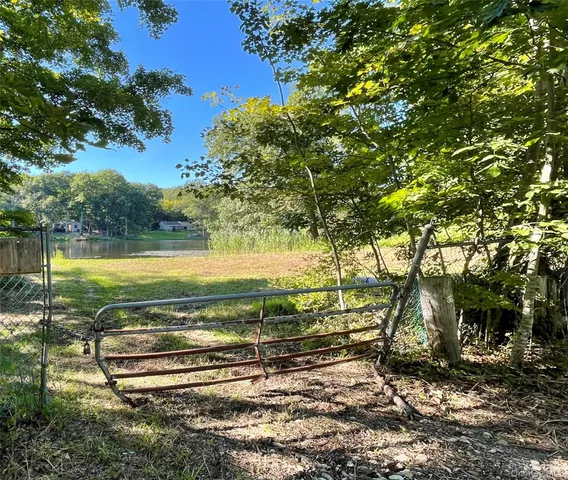 a view of a yard with an outdoor space