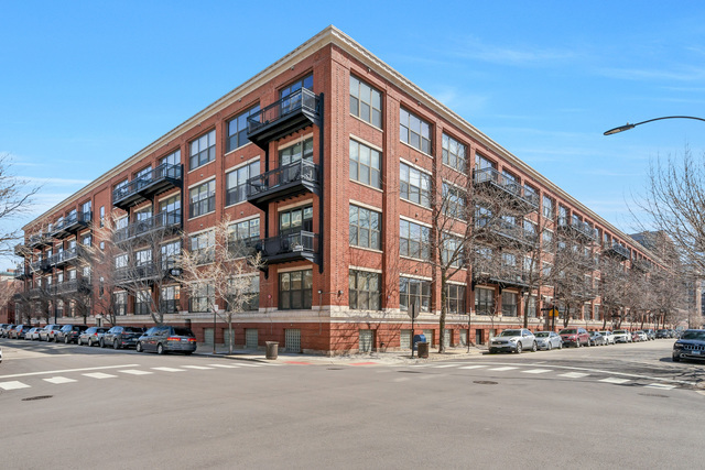 a view of a building and a street