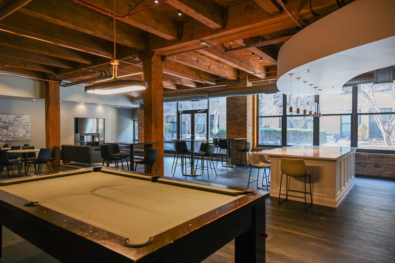 1040 West Adams Street, Unit 608 Chicago, IL 60607 - Photo 21 of 24 a room with pool table and windows