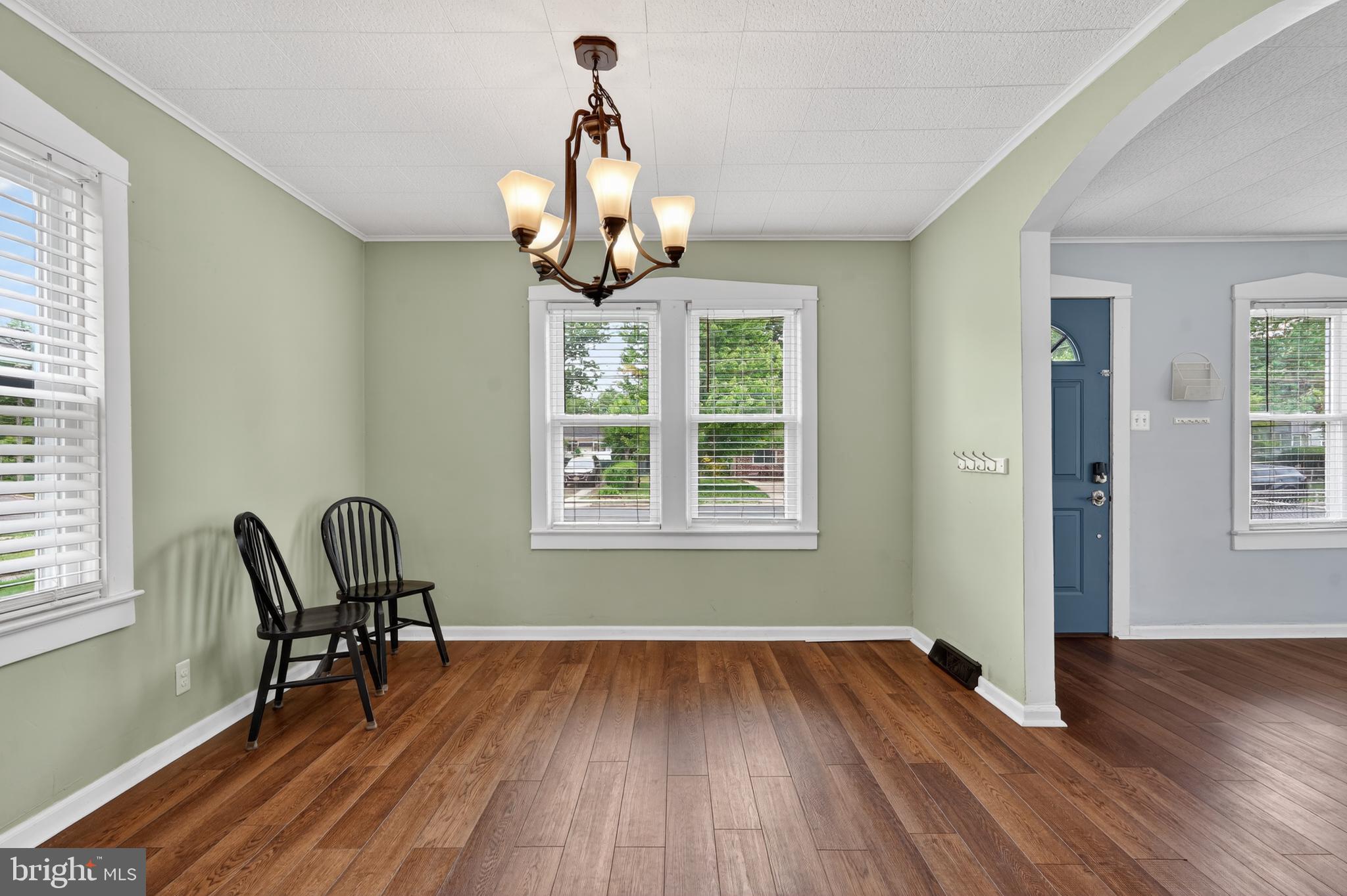106 Ford Street Voorhees, NJ 08043 - Photo 12 of 36 a view of a dining room with furniture window and wooden floor