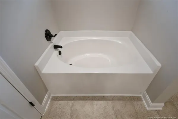 a bathroom with a bathtub