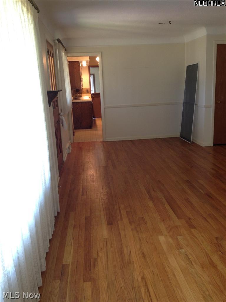 37700 Bainbridge Road Solon, OH 44139 - Photo 3 of 13 Formal Dining Room with hardwood floors