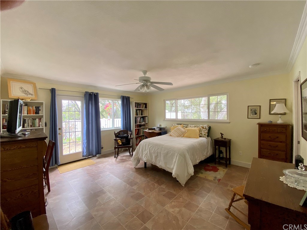 7605 San Gregorio Road Atascadero, CA 93422 - Photo 13 of 22 a bed room with a bed and furniture