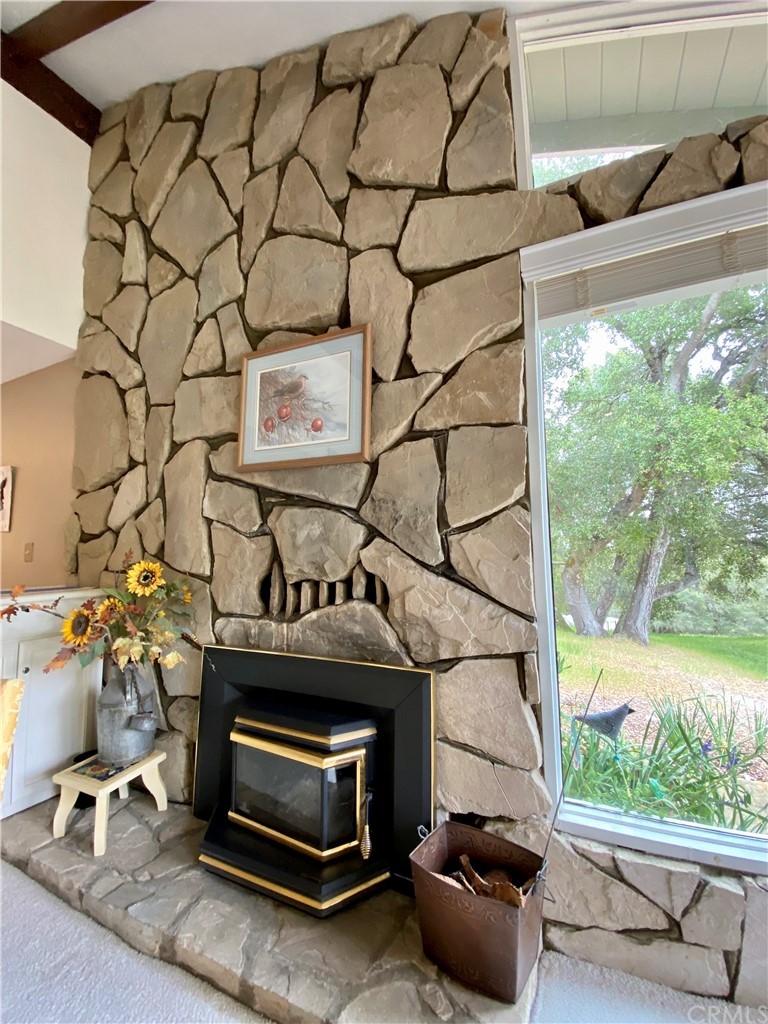 7605 San Gregorio Road Atascadero, CA 93422 - Photo 7 of 22 a kitchen with a stove and a table