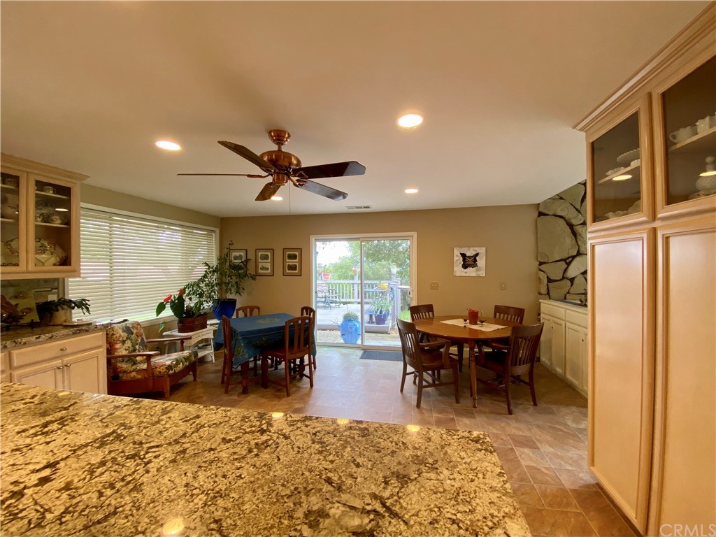 7605 San Gregorio Road Atascadero, CA 93422 - Photo 10 of 22 a living room with fireplace furniture and a large window
