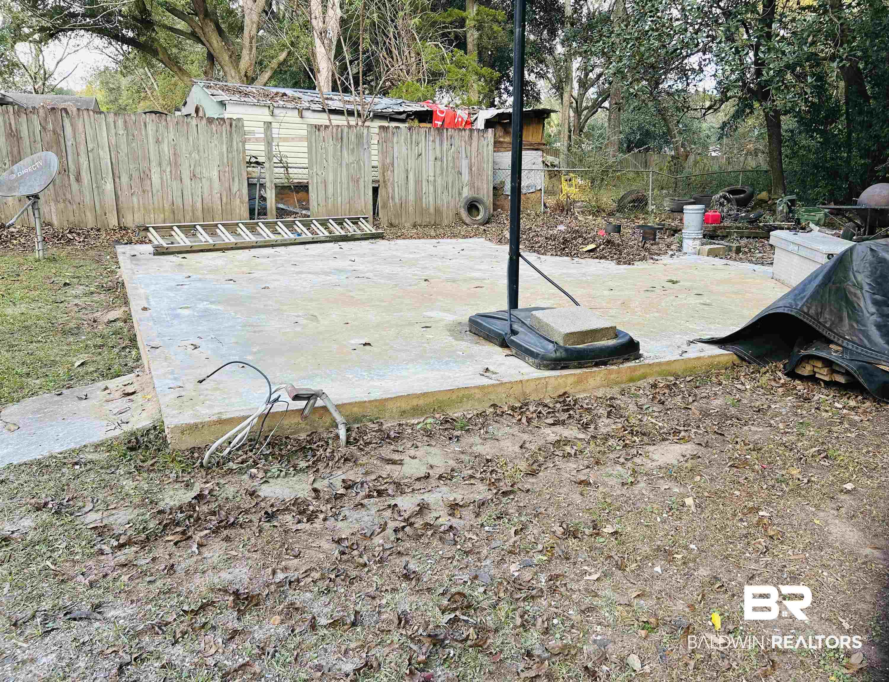 1600 Decatur Street Mobile, AL 36618 - Photo 5 of 5 Fenced backyard with a patio