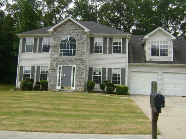 2931 Duncan Place Decatur, GA 30034 - Photo 1 of 1 a front view of a house with a yard